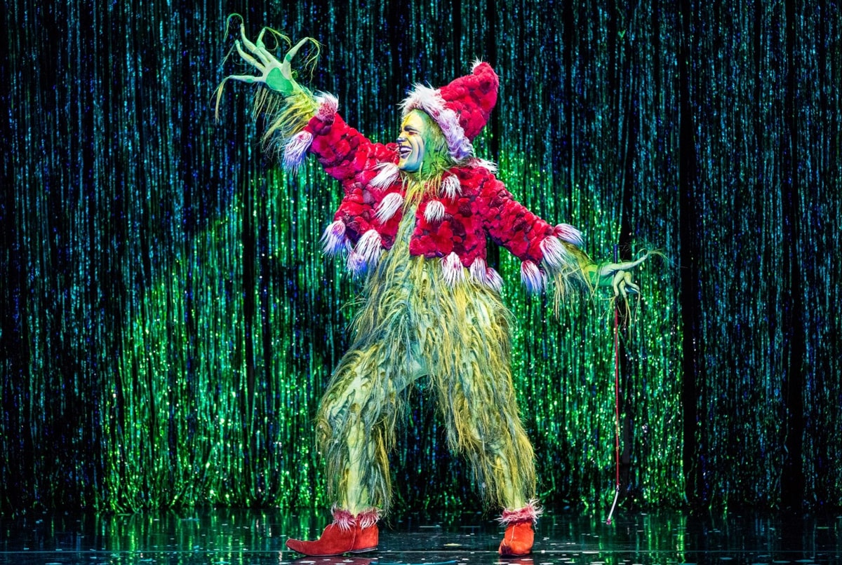 actor dressed up as the grinch at the orpheum in memphis in winter