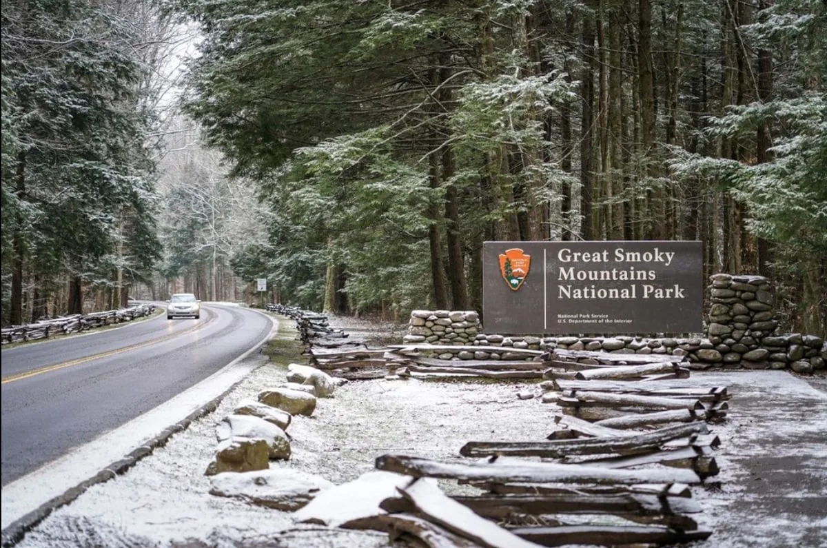 entrance to the great smoky mountains national park with snow on the ground