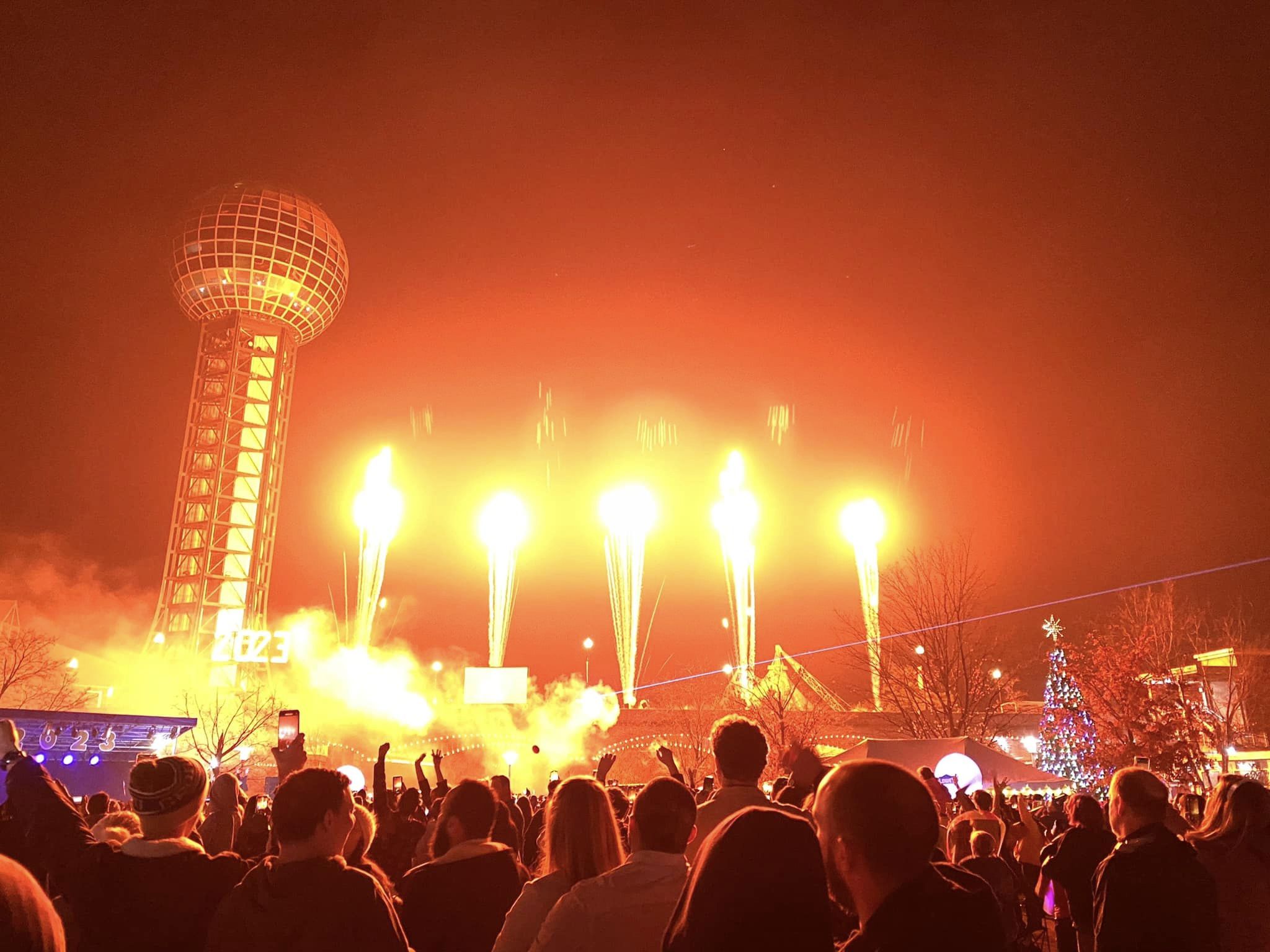 people watching fireworks at the knoxville sunsphere in downtown knoxville tn for new year's eve 