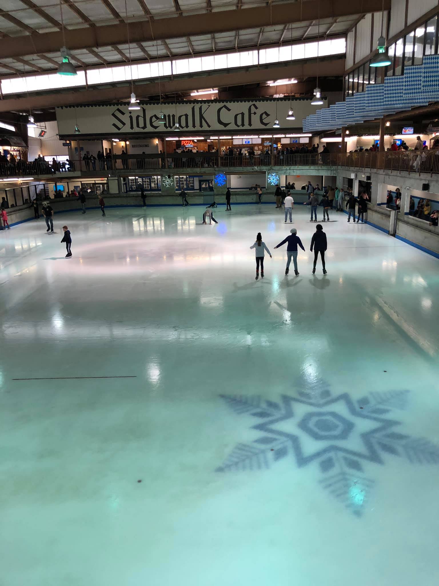 people ice skating in an indoor rink at ober gatlinburg tn as a place to go ice skating near knoxville tn 