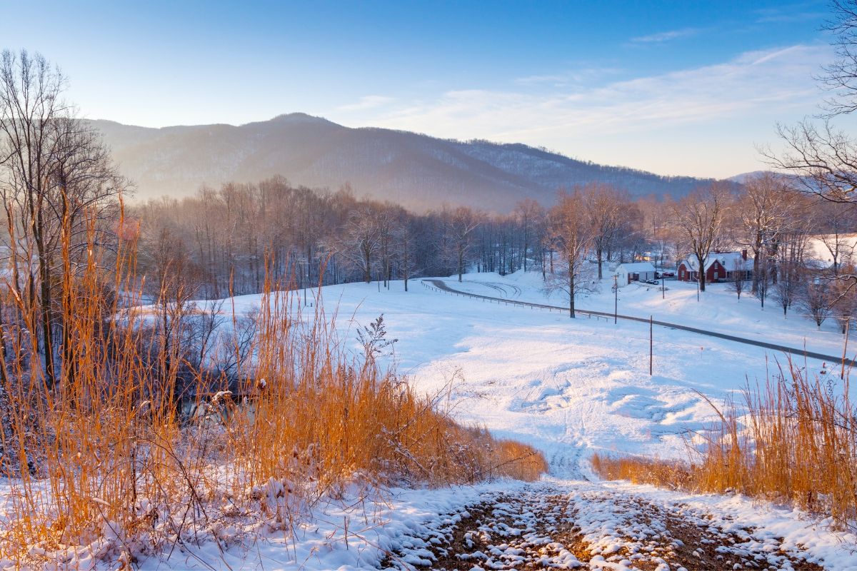 landscape image of mountains and snow covered ground in tennessee during winter