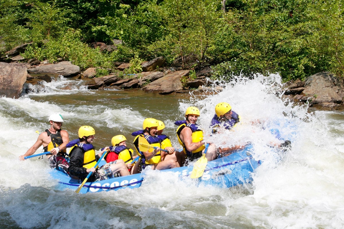People whitewater rafting with ocoee rafting tour guides in knoxville tn 