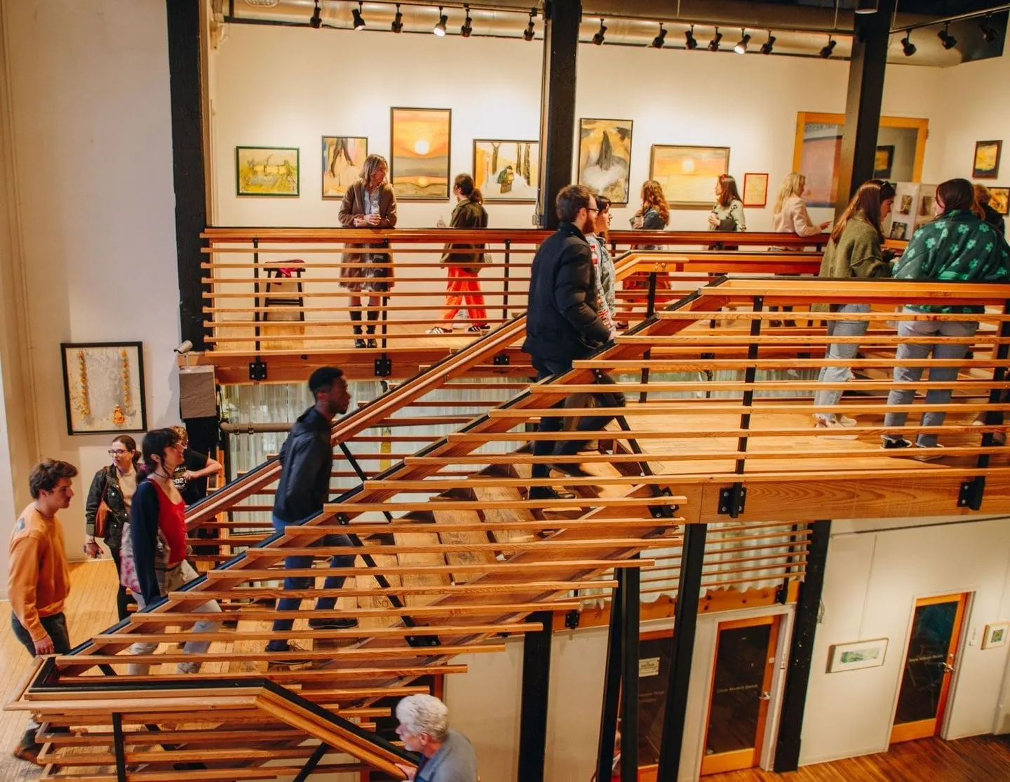 People walking up the stairs on the First Friday Art Walk in Knoxville TN 