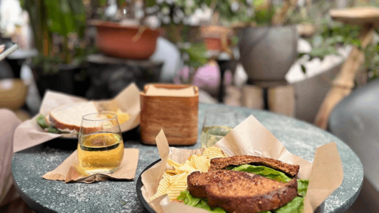 This Hidden Oasis in Tennessee Is a Greenhouse Bar Where Vines Surround Every Table