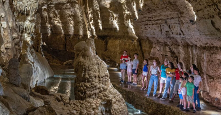 A Texas Cave Where Crawling and Climbing Lead to Glowing Blue Water