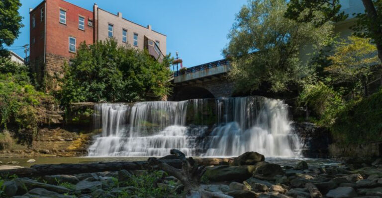 This Tiny Ohio Village Has A Huge Waterfall Crashing Right Through Its Downtown