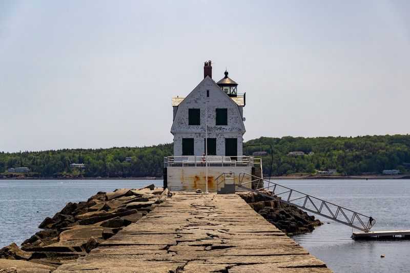 A Lighthouse at the End of the Sea Path