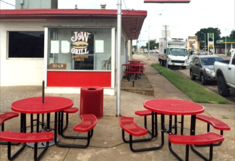 The Red Stools and Sizzling Griddle Set the Scene