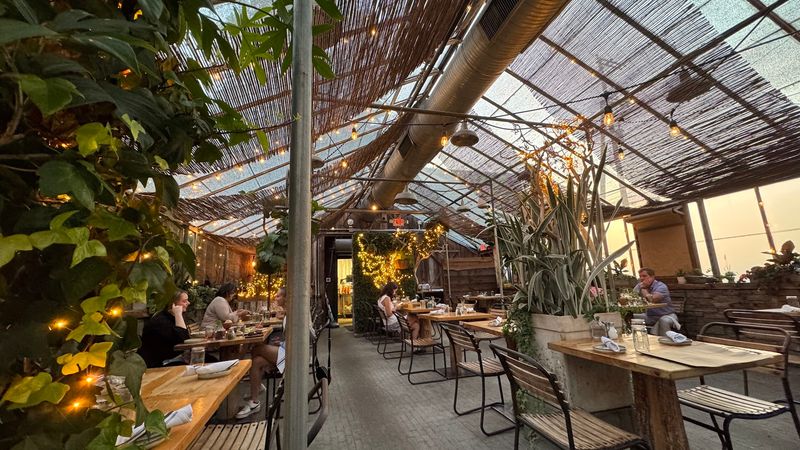 A Greenhouse Dining Room That Feels Like a Fairytale
