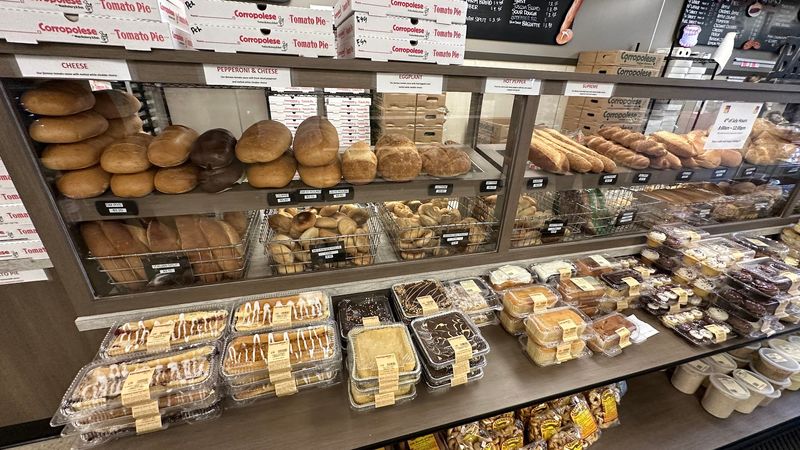 A bakery case full of reasons to linger