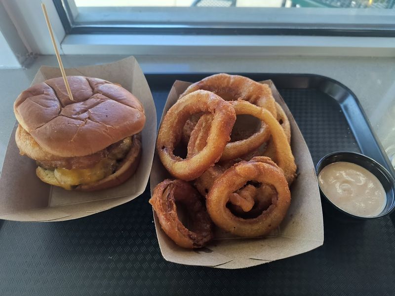 Burgers and dogs help round out the full experience Burgers and dogs help round out the full experience