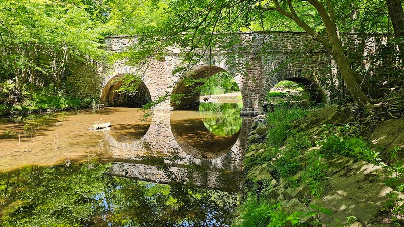 Scenic bridges, gazebos, and quiet resting spots add charm