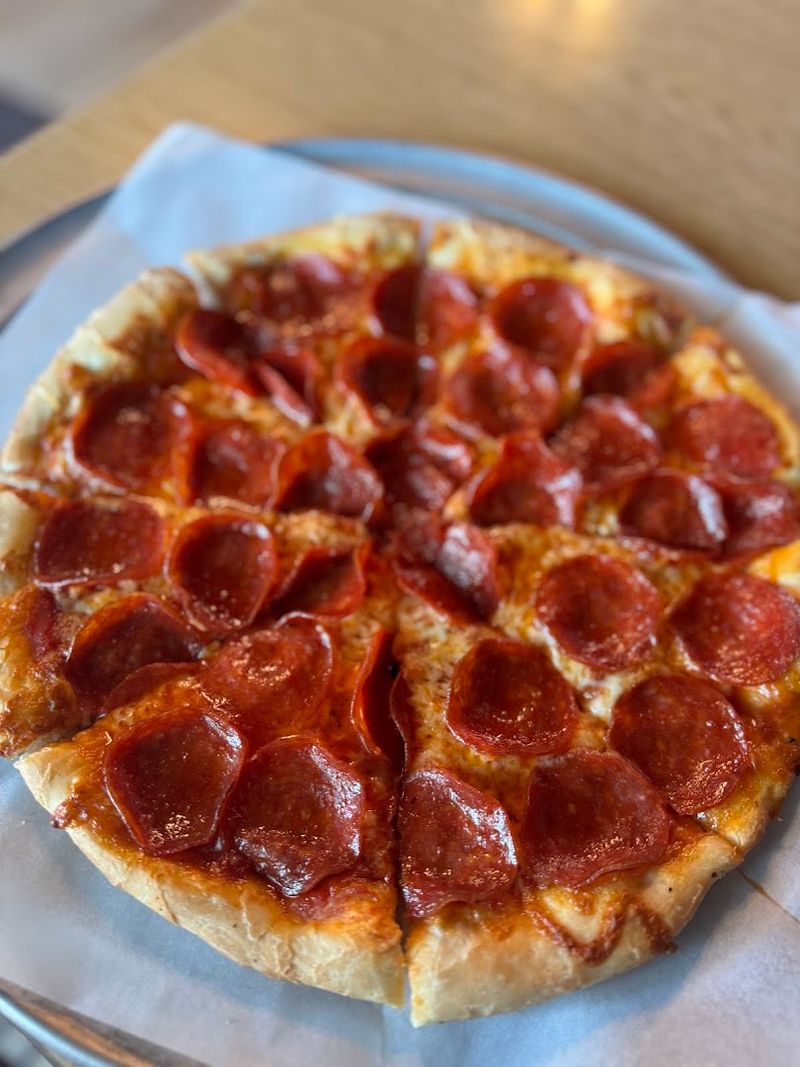 The pizza still gives this place its loyal following The pizza still gives this place its loyal following