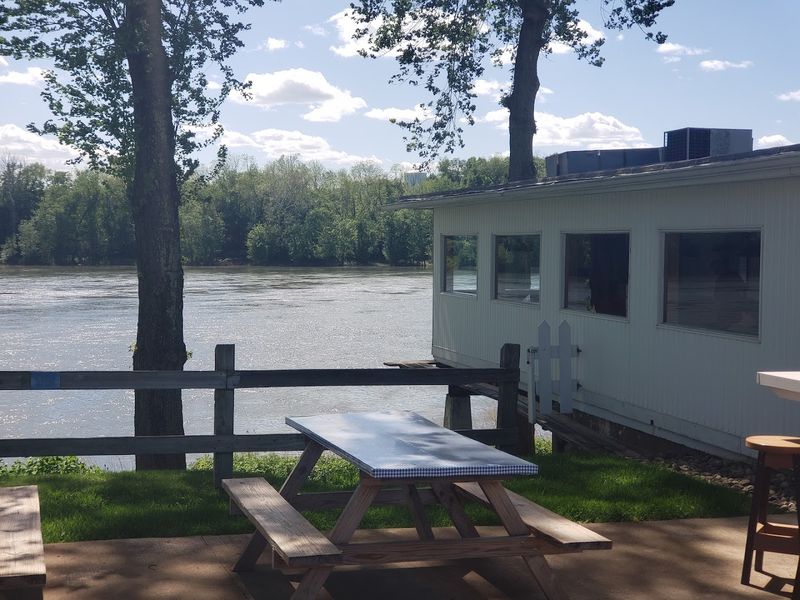 The riverside setting is part of the experience