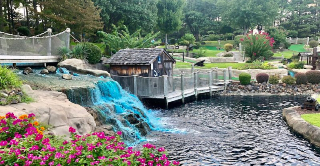 This Northern Michigan Mini-Golf Spot Feels Like an Adventure Park With Caves, Waterfalls, and Pirate Ships