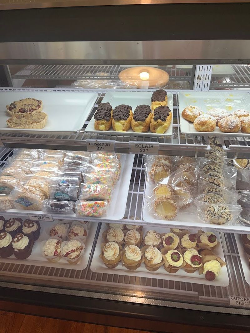 A bakery case packed with reasons to stay awhile A bakery case packed with reasons to stay awhile