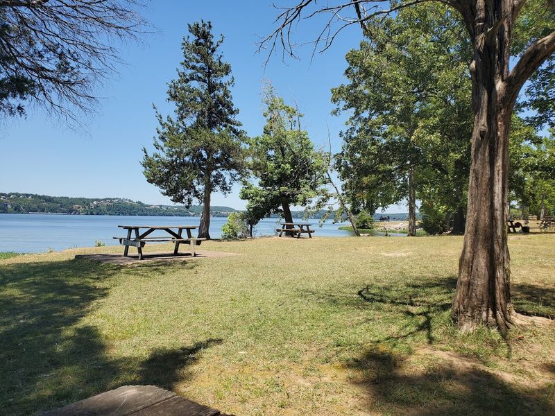 Camping here is shady, spacious, and a little more nuanced than the brochure version Camping here is shady, spacious, and a little more nuanced than the brochure version