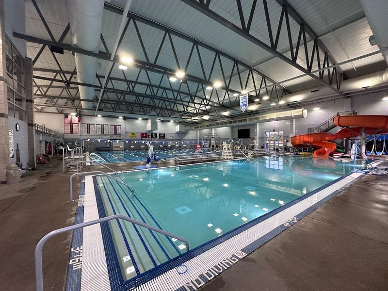 Indoor Pool With Diving Board and Lap Swimming