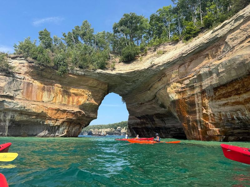 Kayak beneath Pictured Rocks National Lakeshore Kayak beneath Pictured Rocks National Lakeshore