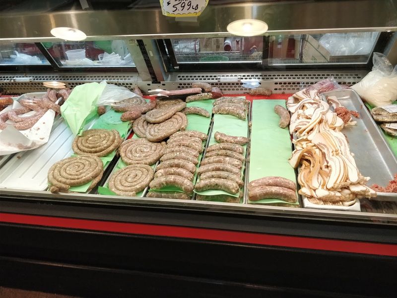 Old-World Butcher Counter With House-Made Sausages Old-World Butcher Counter With House-Made Sausages