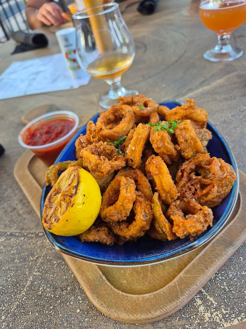 Start with the calamari and stay for the burger Start with the calamari and stay for the burger