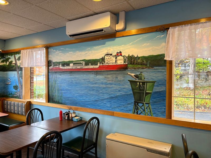 The river murals give the diner its own identity