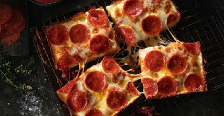 Cheese, Crust, And Local Pride Rule At These 13 Michigan Pizza Favorites