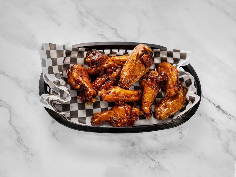 A Buffet of Wings Hot Dogs and Fried Fish Keeps Everyone Well Fed A Buffet of Wings Hot Dogs and Fried Fish Keeps Everyone Well Fed