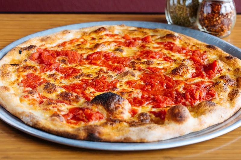 A Century-Old Family Recipe Lives On in Every Thin-Crust Pie A Century-Old Family Recipe Lives On in Every Thin-Crust Pie