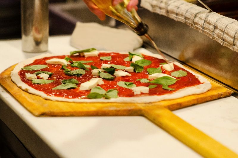 A Hot Brick Oven Gives the Crust Its Signature Char and Chew A Hot Brick Oven Gives the Crust Its Signature Char and Chew