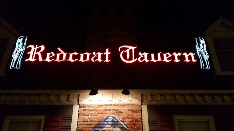 A Red-Glow Tavern That Announces Itself Quietly