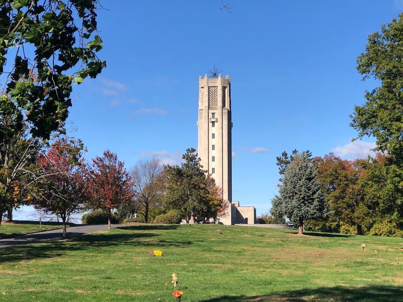 A griffin sundial and historic memorial tower add unexpected artistic details A griffin sundial and historic memorial tower add unexpected artistic details