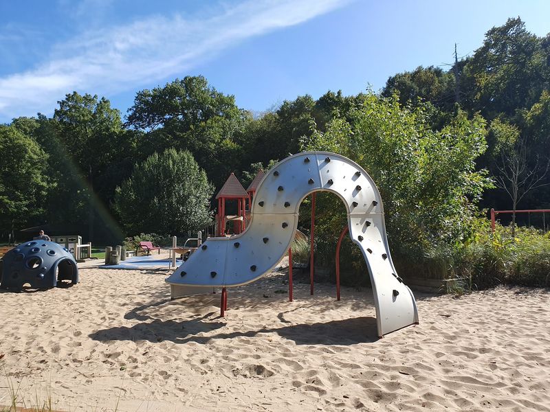 A sandy playground that looks ready for summer