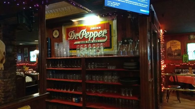Bartenders Work the Grill Right Behind the Bar Bartenders Work the Grill Right Behind the Bar