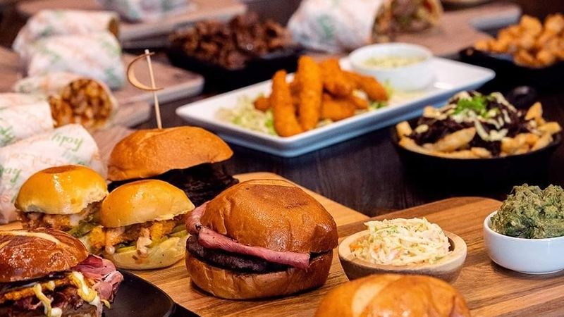 Burgers, Wraps, Rice Bowls, and Loaded Fries Round Out the Menu Burgers, Wraps, Rice Bowls, and Loaded Fries Round Out the Menu