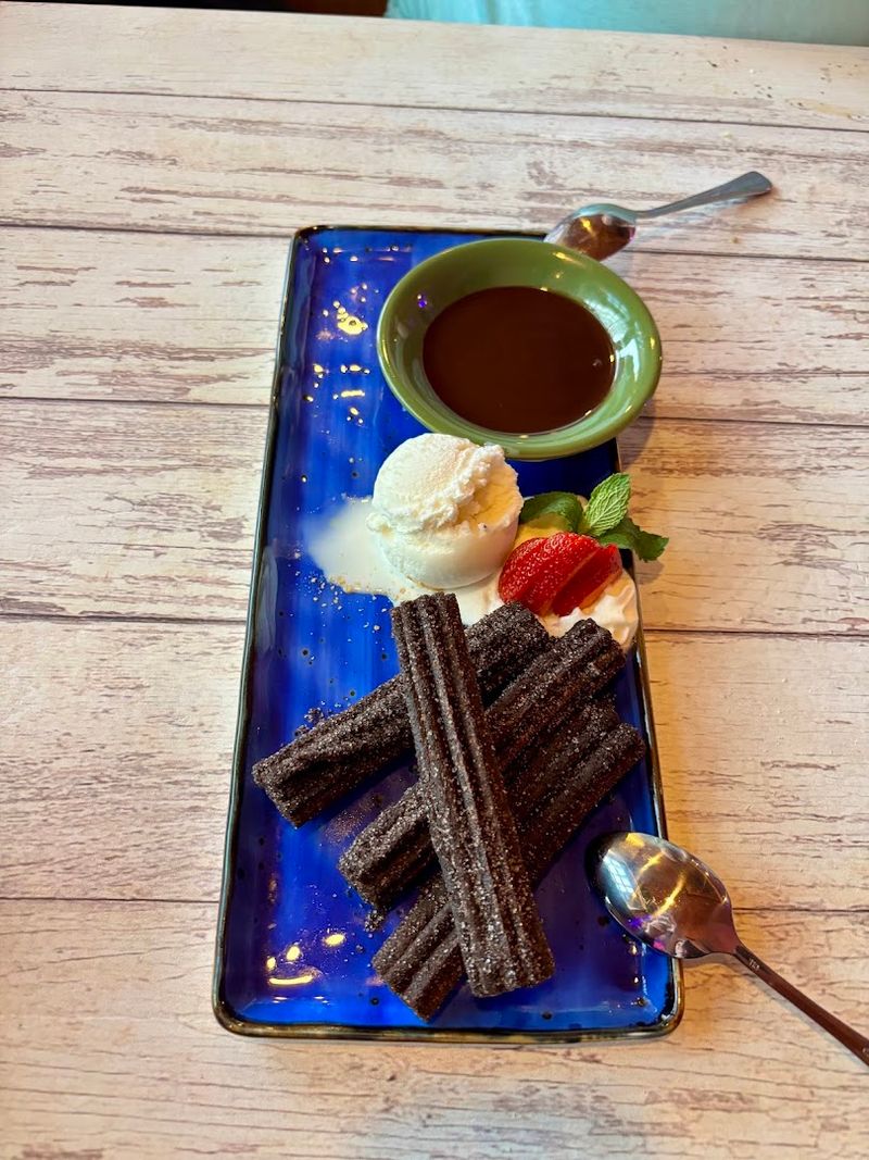Craft Cocktails and Oreo Churros Keep the Surprises Coming Until the Last Bite