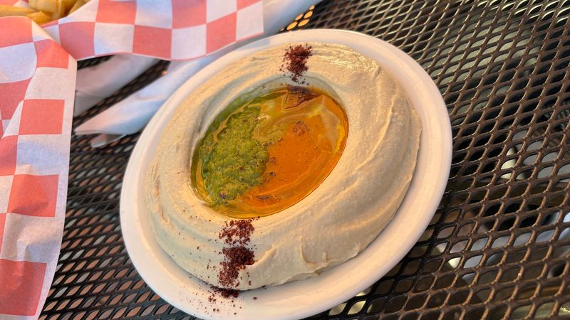 Creamy hummus and colorful salads turn every platter into a full spread