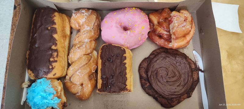 Custard So Heavy It Almost Weighs a Pound: The Signature Donut Experience