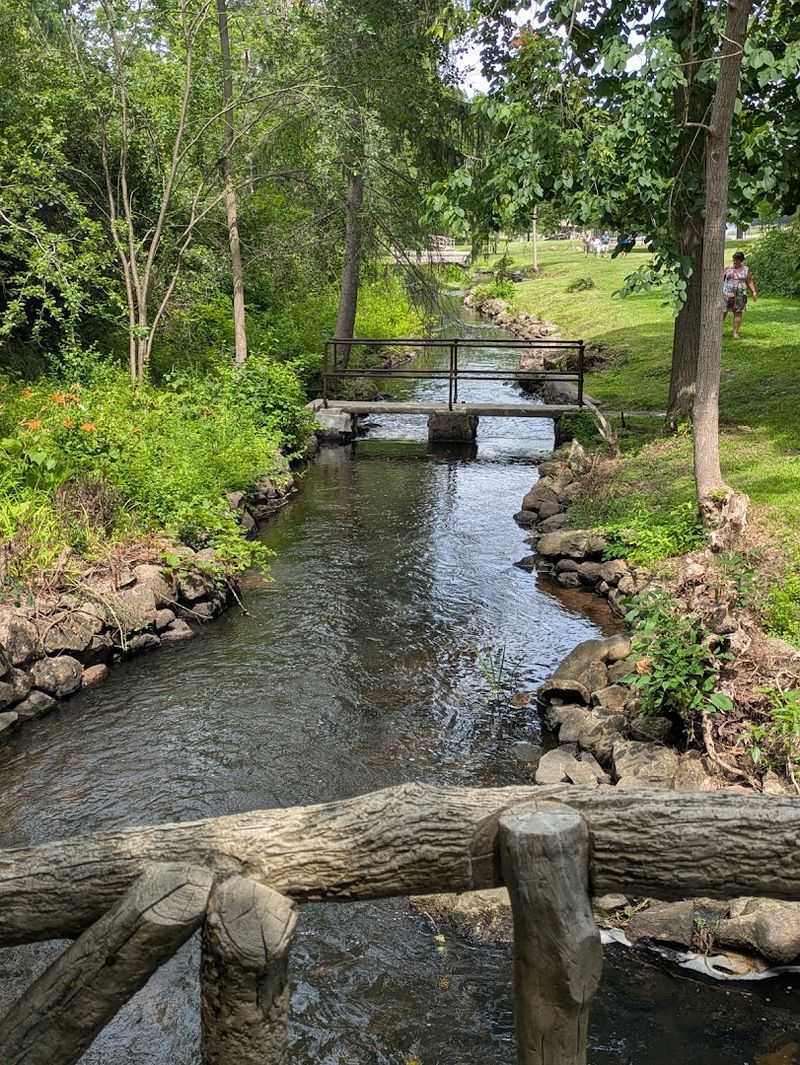 Following The Creek Path From Bridge To Bridge Following The Creek Path From Bridge To Bridge