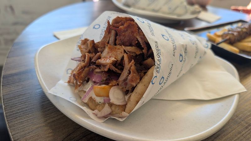 Handheld Gyros Pair Home-Baked Pita With Your Choice of Meat and Toppings Handheld Gyros Pair Home-Baked Pita With Your Choice of Meat and Toppings
