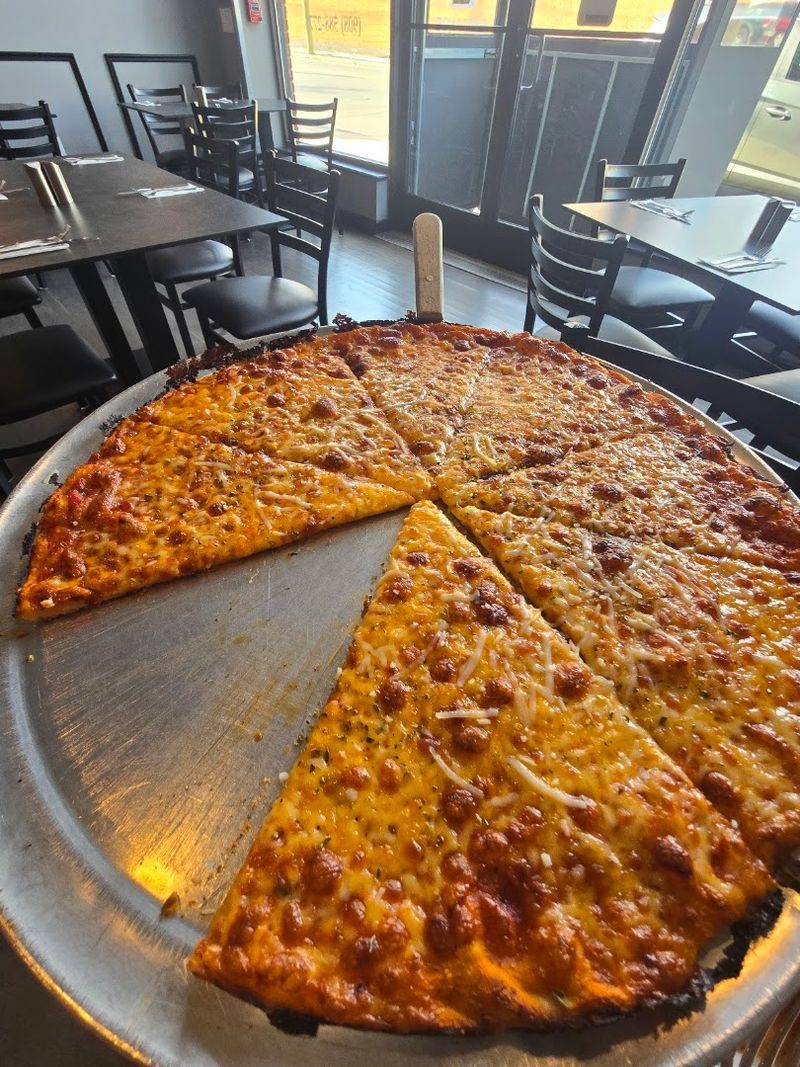 Hearth-baked crusts and crispy pan pies set this neighborhood spot apart