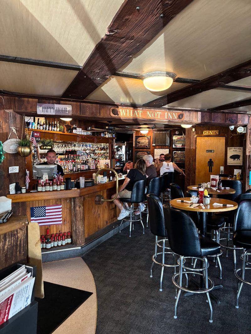 Log beams, darker corners, and a room with its own mood