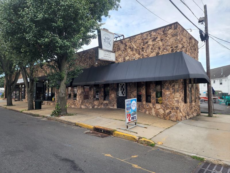 Nip N Tuck — Long Branch Nip N Tuck — Long Branch