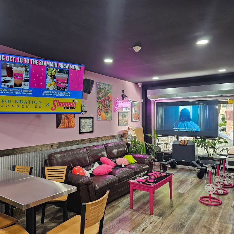Pink Walls, Local Art, and Cozy Corners Make the Café Easy to Linger In