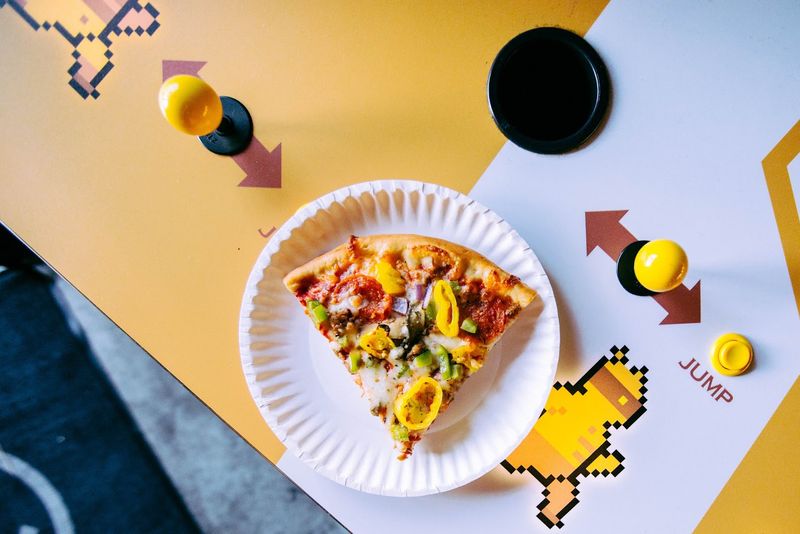 Pizza, Tokens, And Deals That Keep The Night Going Pizza, Tokens, And Deals That Keep The Night Going