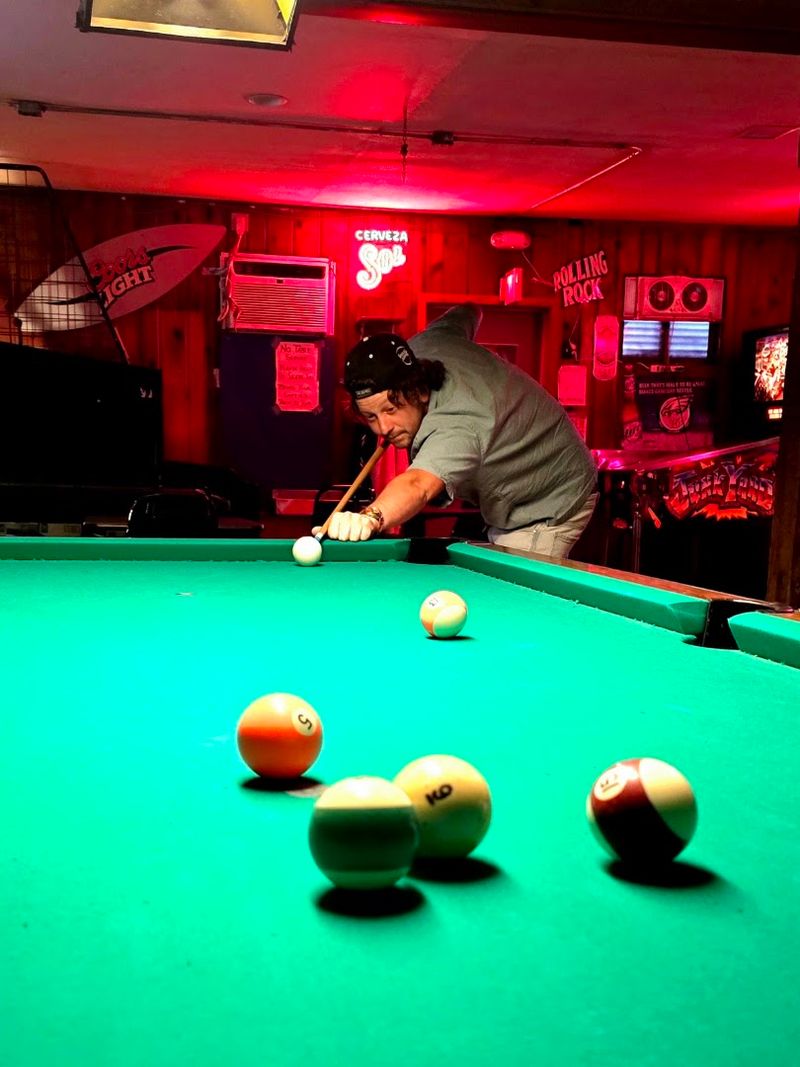 Pool, pinball, and a 22-foot shuffleboard table keep the night moving