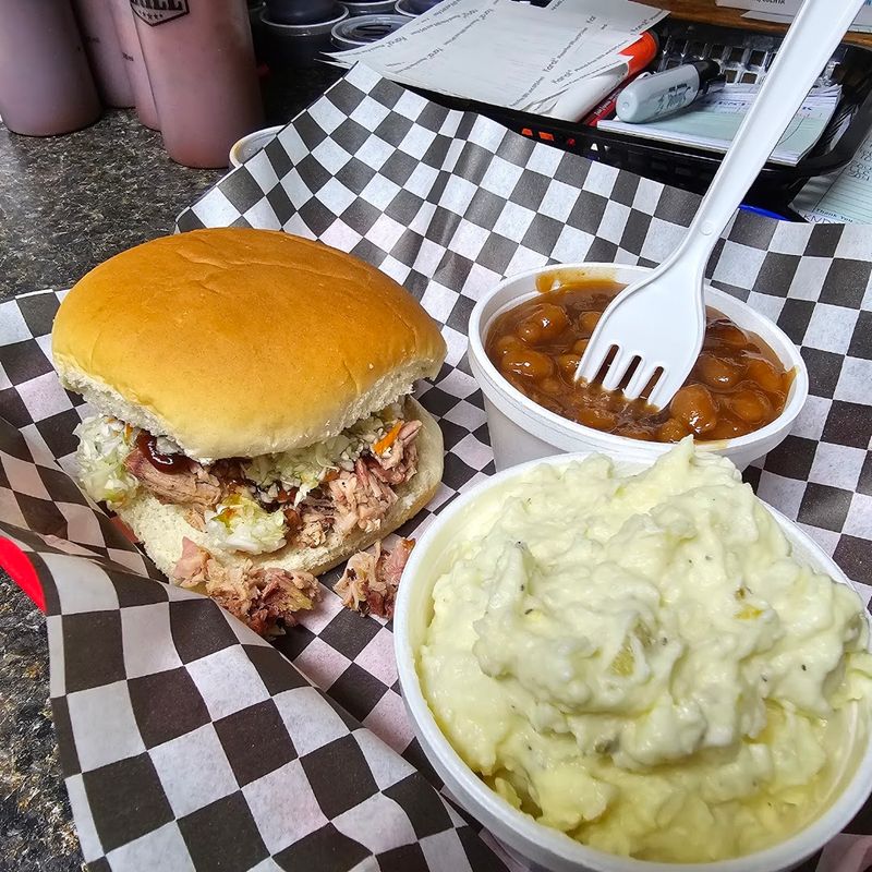 Putting Coleslaw Directly on a Pulled-Pork Sandwich Putting Coleslaw Directly on a Pulled-Pork Sandwich