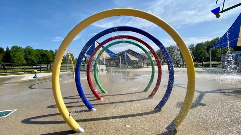 Summer at the Splash Pad and Sandy Beach Area Summer at the Splash Pad and Sandy Beach Area