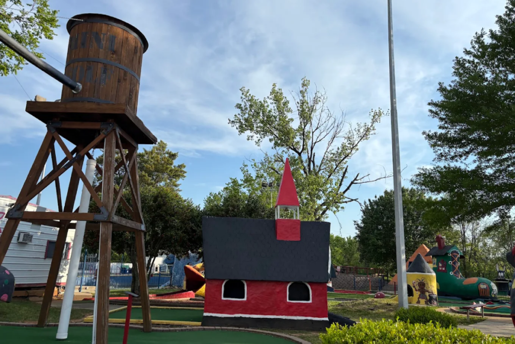 Tennessee's Quirkiest Old-School Mini-Golf Course Has A Giant Dinosaur Guarding The Greens