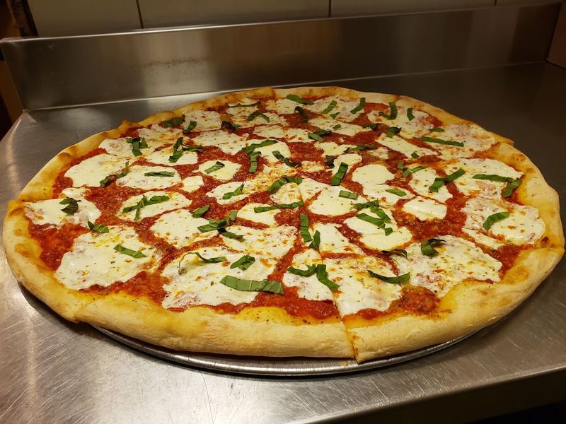 The Menu Goes Beyond Traditional Cheese and Pepperoni The Menu Goes Beyond Traditional Cheese and Pepperoni